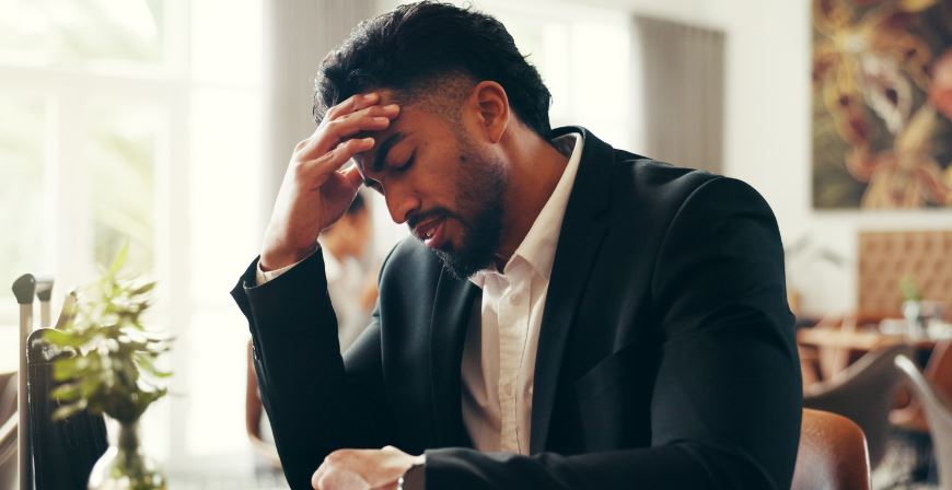 man who is jetlagged and would benefit from mobile iv hydration therapy in sarasota