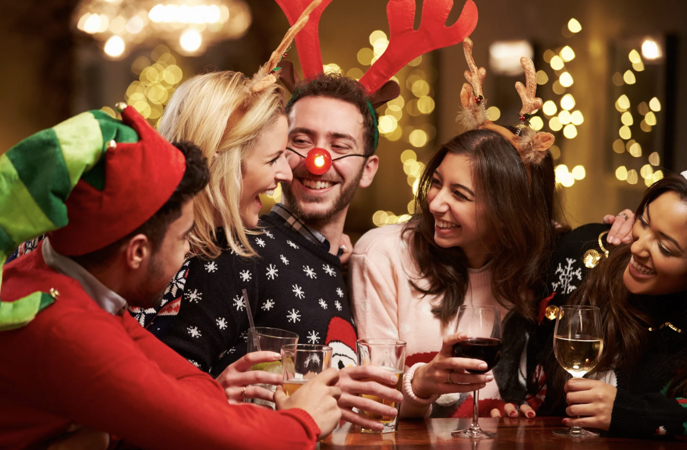 friends drinking at christmas party sarasota